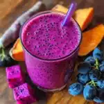 purple peel exploit recipe smoothie in glass with fresh ingredients