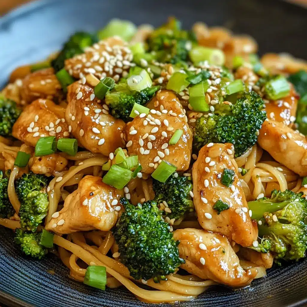 Plated chicken and broccoli stir fry with noodles