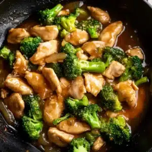 Chicken and broccoli stir fry sauce in wok